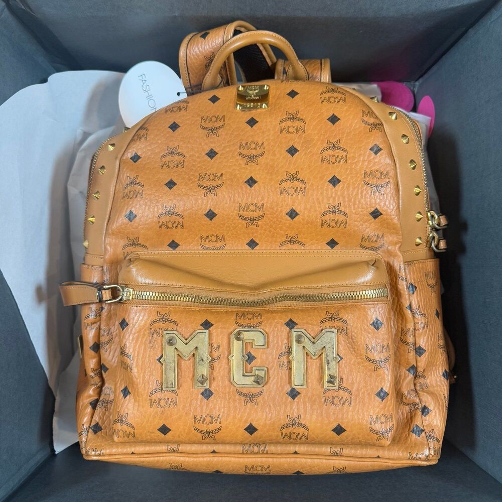 MCM Visetos Studded Medium Stark M Logo Collection Backpack Cognac Monogram